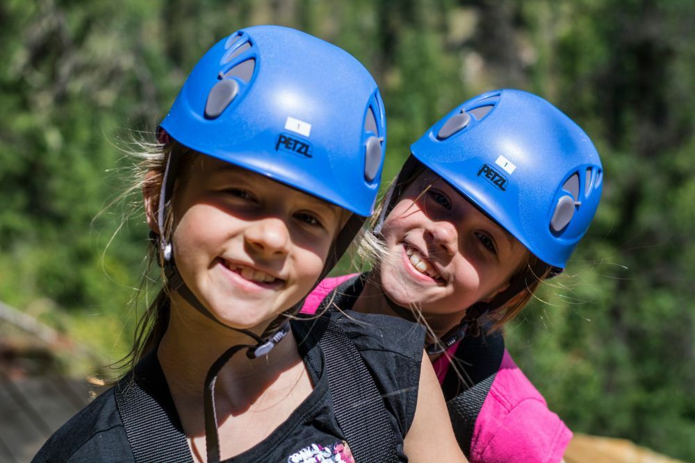 Let your kids experience ziplining, one of the most fun things to do in British Columbia. Photo Credit: <a href="http://www.nelsonkootenaylake.com/">Nelson Kootenay Lake Tourism</a>