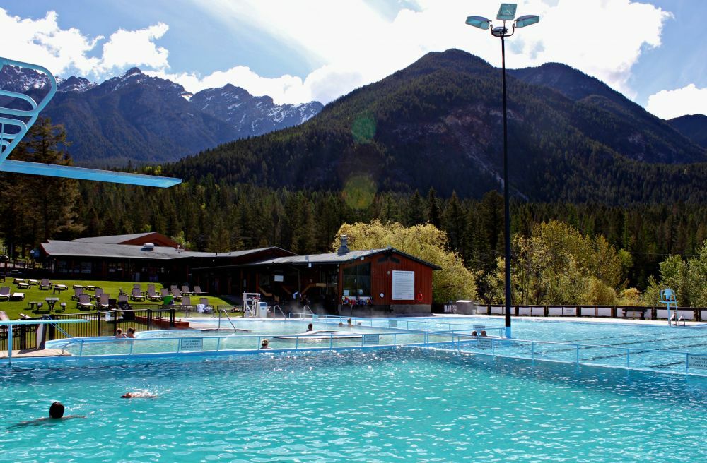 Get your adrenaline rush by ziplining and then relax by soaking in natural mineral hot springs.
